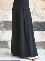 بنطلون واسع بثنيات